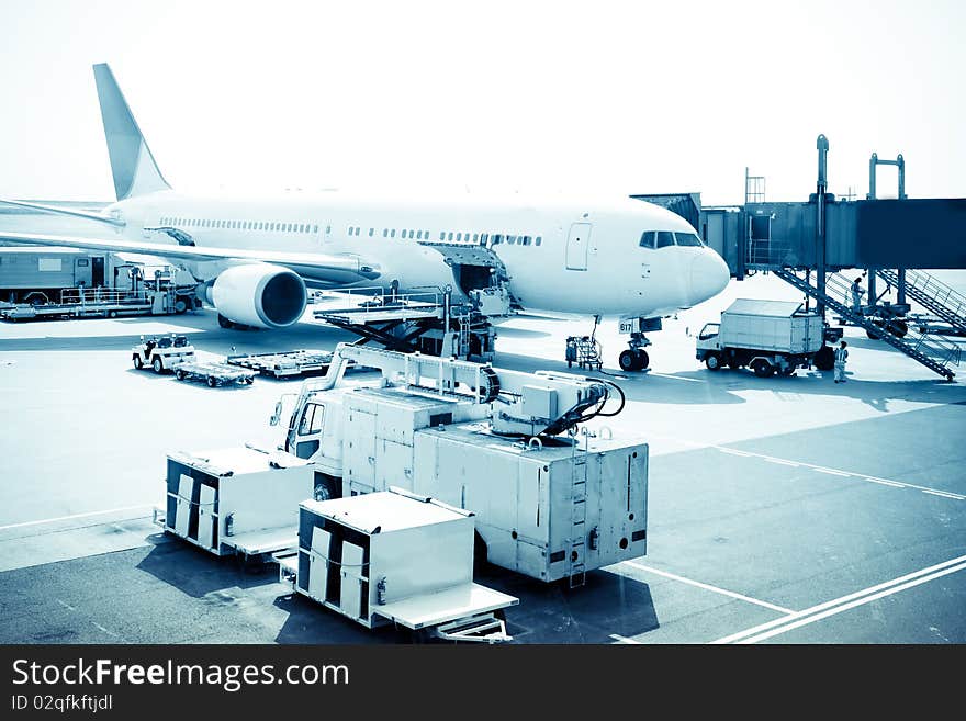 Airplane is waiting for departure in pudong airport shanghai china. Airplane is waiting for departure in pudong airport shanghai china.