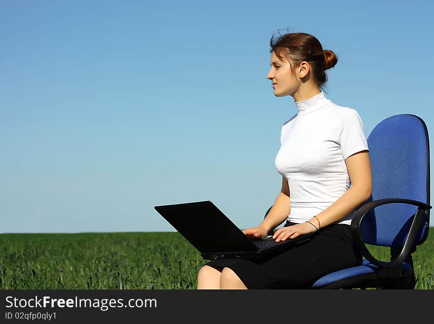 Young woman with laptop outdoor. Young woman with laptop outdoor