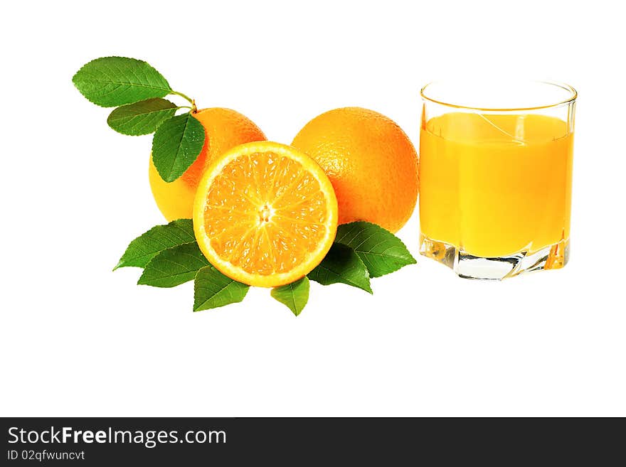 Fresh oranges with a glass of orange juice isolated over white background. Fresh oranges with a glass of orange juice isolated over white background.