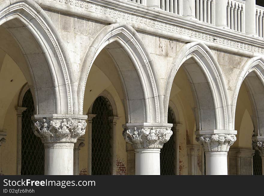 Marble columns at doge palace in Venice in late afternoon light