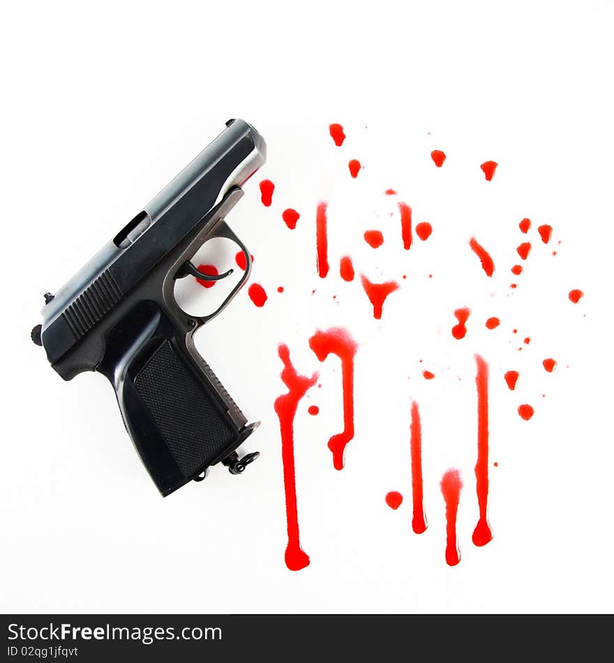 A black with blood drips gun on white