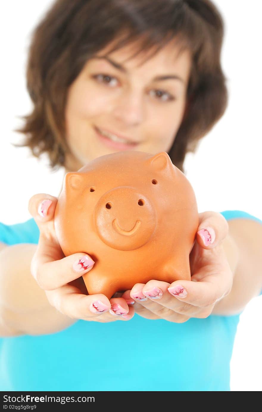 Picture of lovely woman with piggy bank