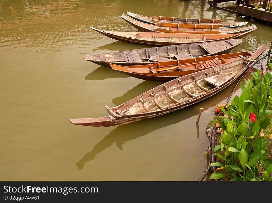 Old boat in waterway from Thailand for transportation and journey. Old boat in waterway from Thailand for transportation and journey.