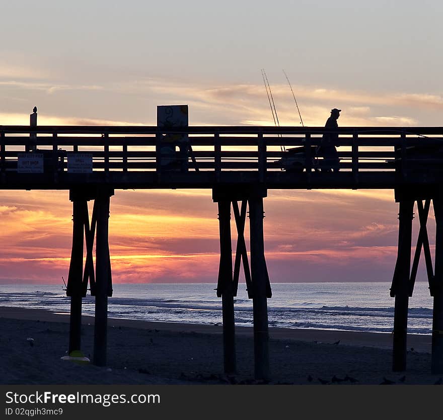 Fisherman On Pier