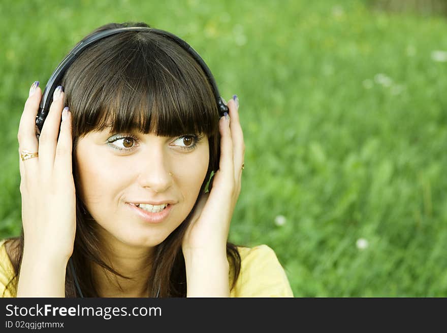 Young woman listening to music