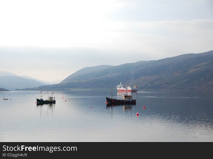 Boats and ship on the sea in the morning. Boats and ship on the sea in the morning.