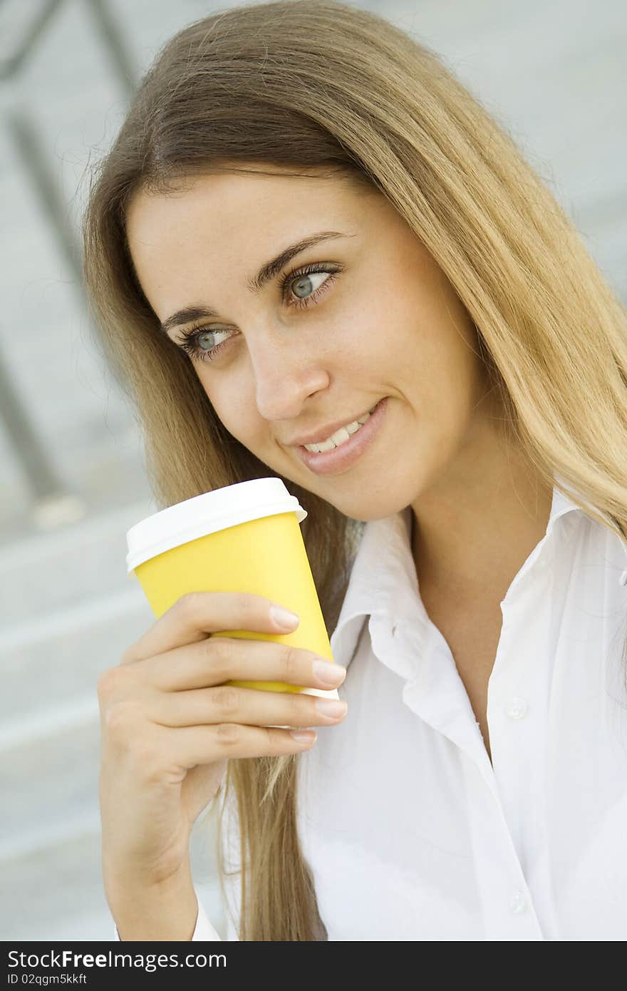 Young successful businesswoman having a coffebreak. Young successful businesswoman having a coffebreak