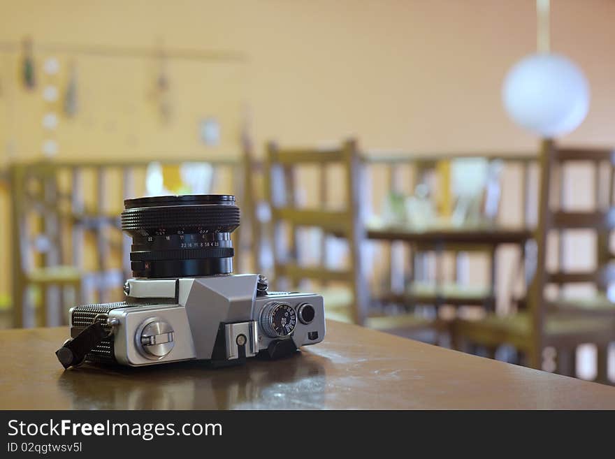 Old SLR lying on a table