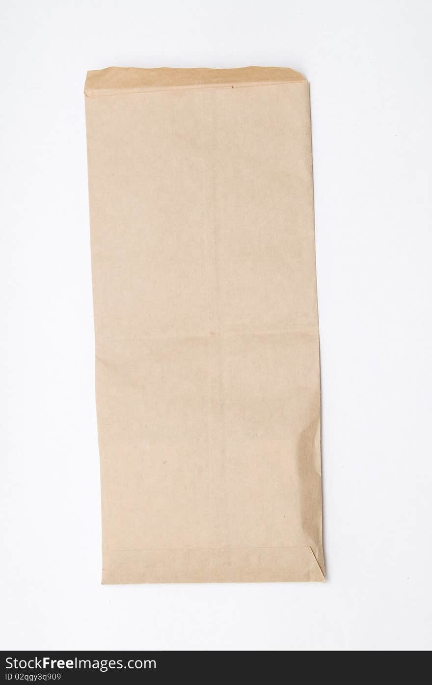 The brown envelope on the white background. The brown envelope on the white background