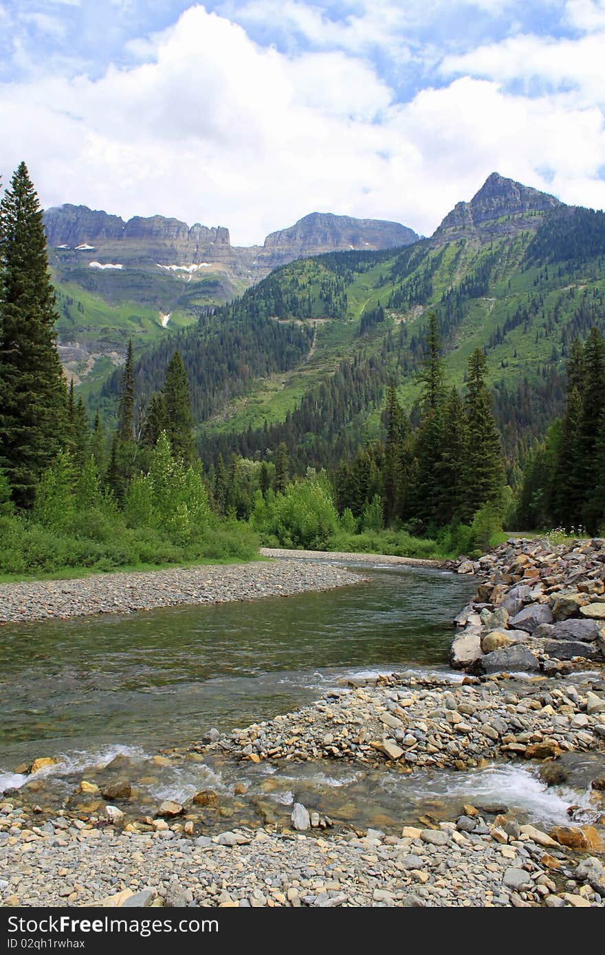 Glacier River, summer morning colorfull rocks and mountains. Glacier River, summer morning colorfull rocks and mountains