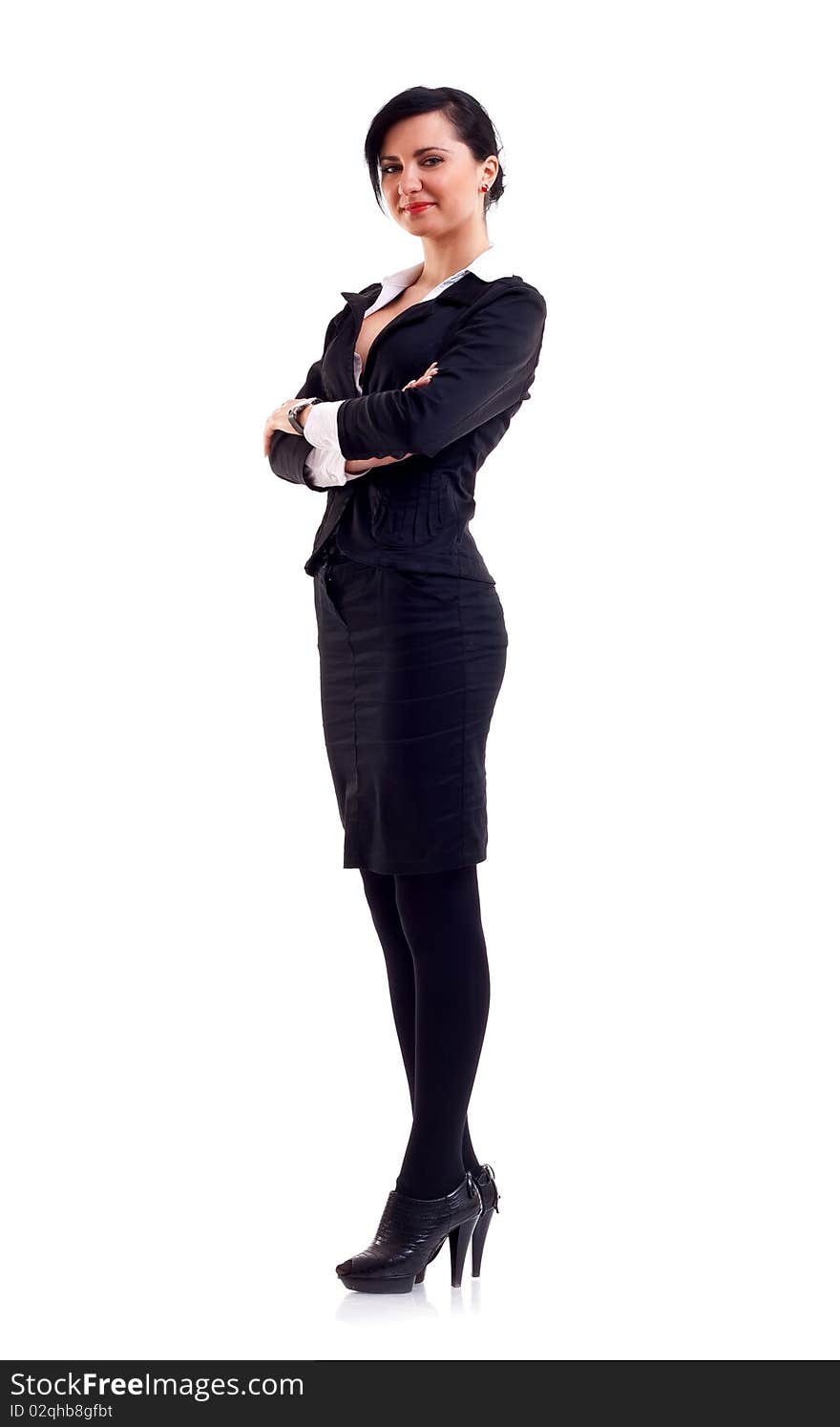 Confident business woman against white background in a black suit