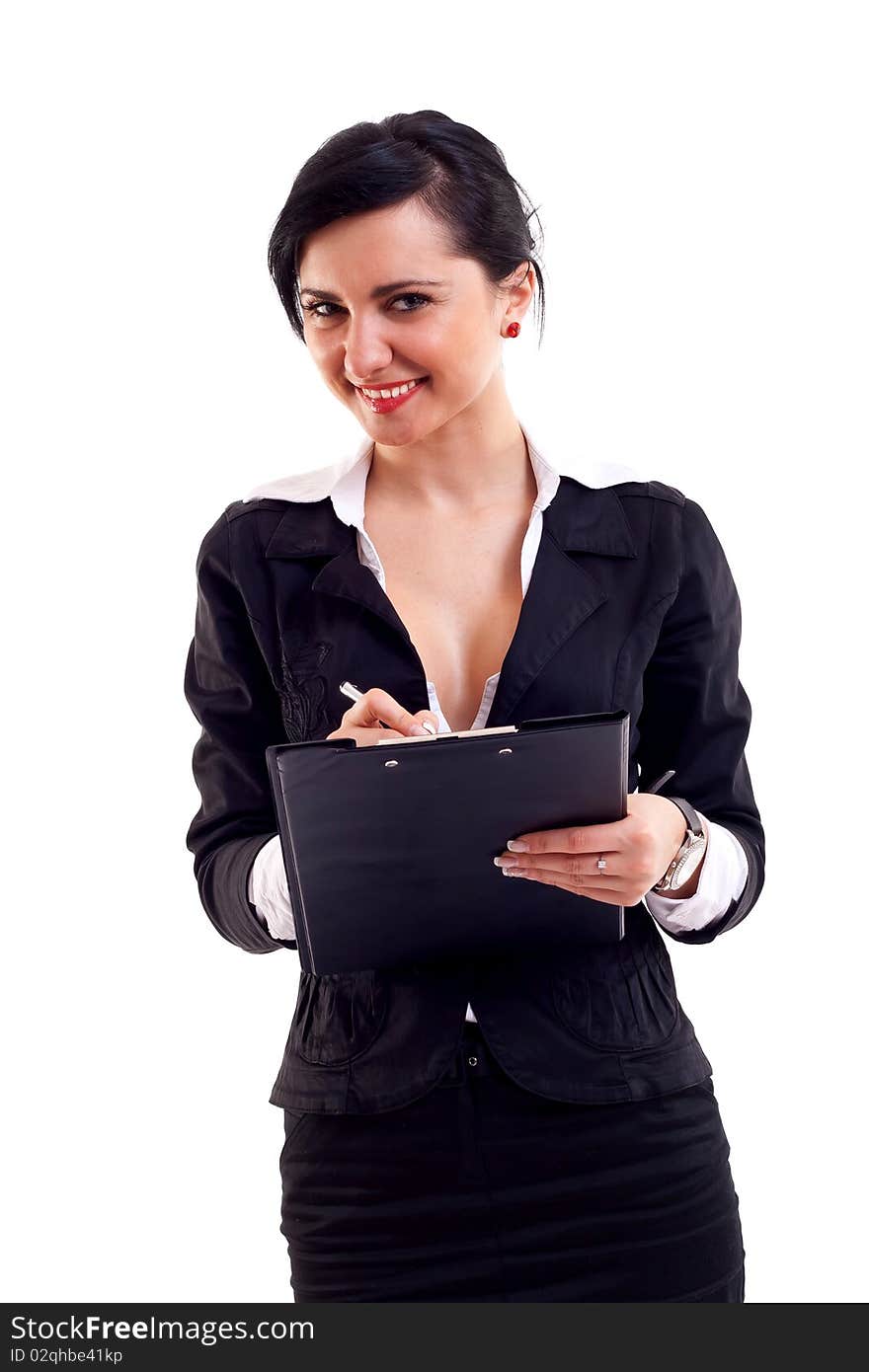 Business woman writing something on a notebook, isolated against a white background.