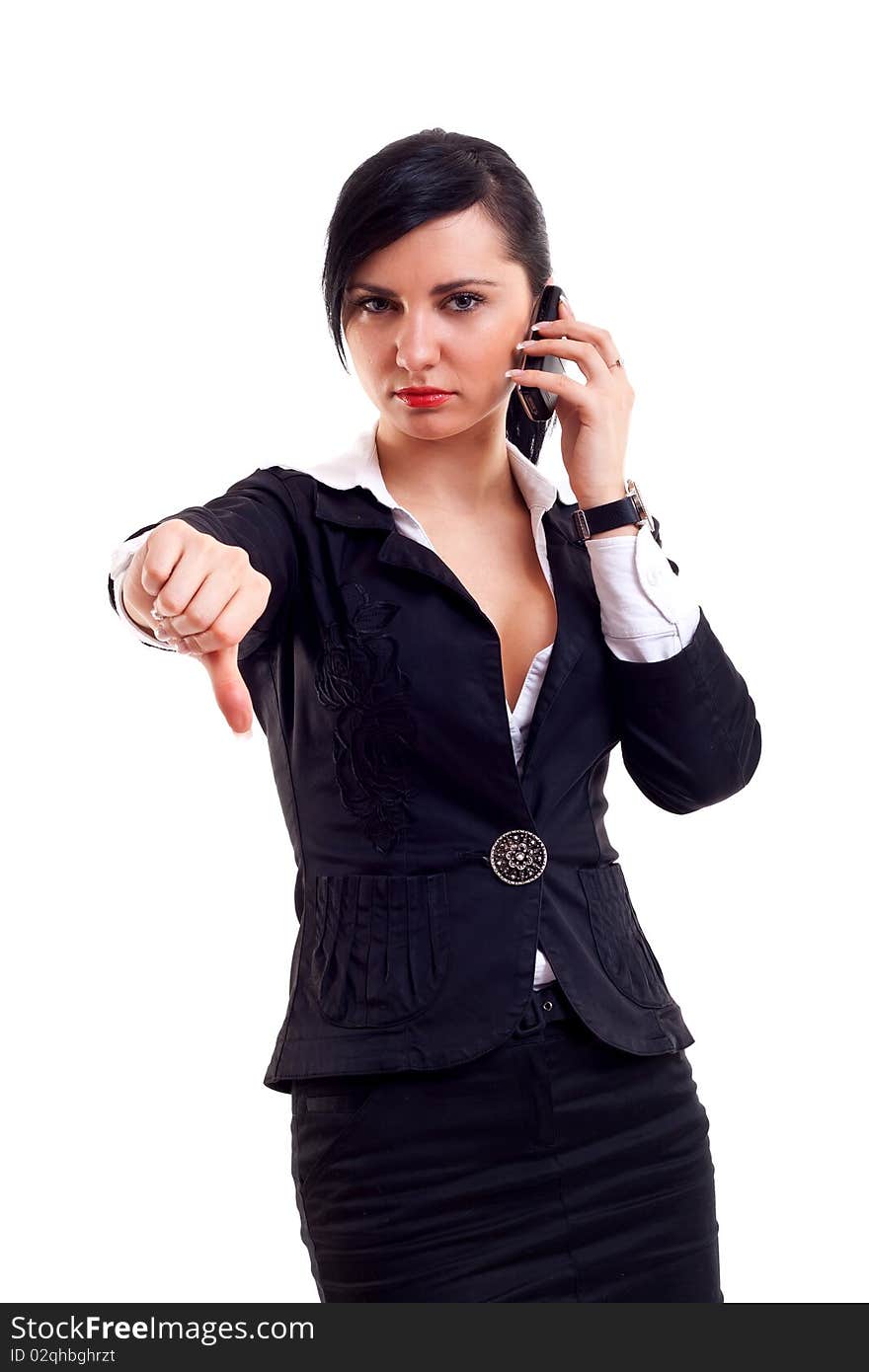 Business woman with thumb down gesture and mobile phone