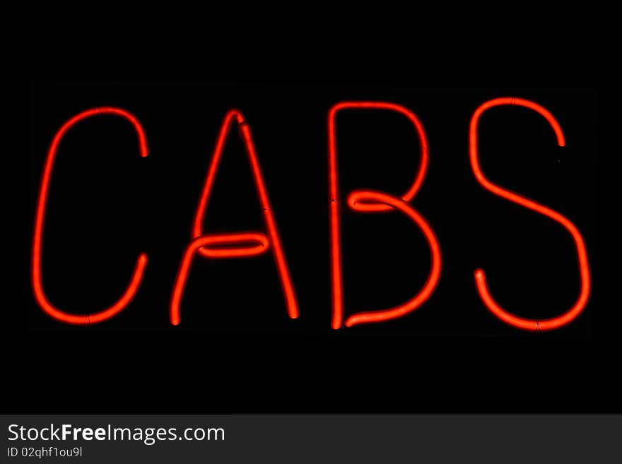 Red neon sign of the word 'CABS' on a black background. Red neon sign of the word 'CABS' on a black background.