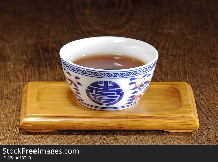 Chinese traditional tea cup on a table. Chinese traditional tea cup on a table