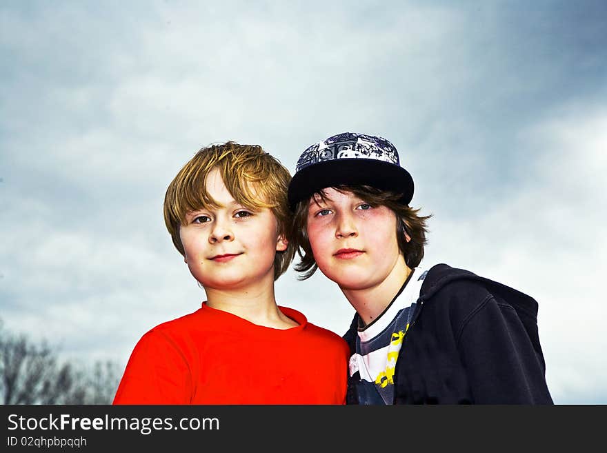 Young boy friends smile and feeling happy at skate park