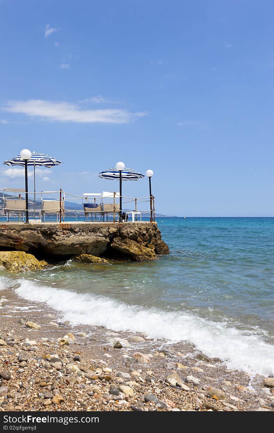 A terrace on the coast with blue sky