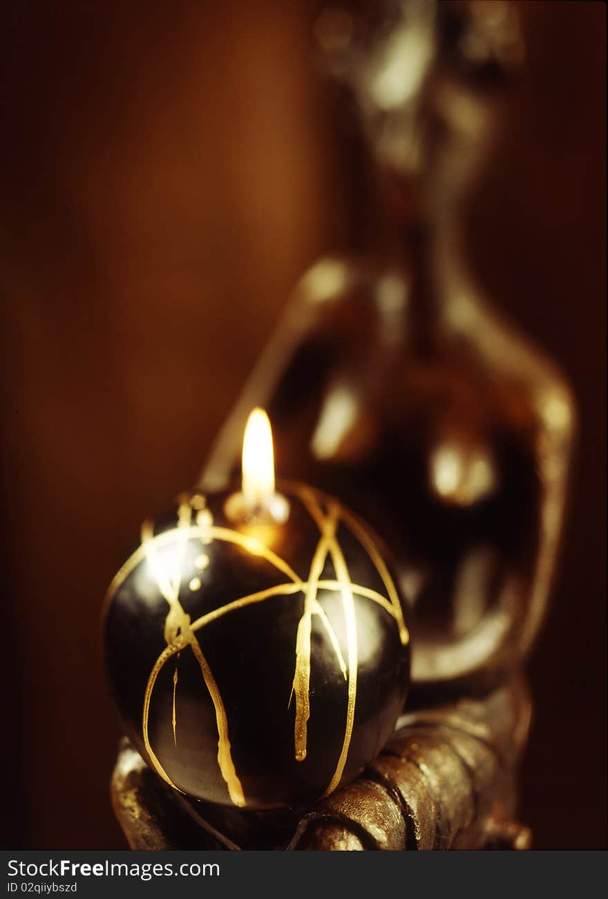 Candles and statues,studio shot