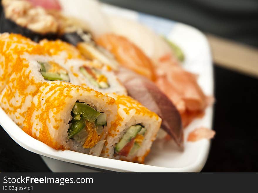 Japanese sushi rolls set on white plate