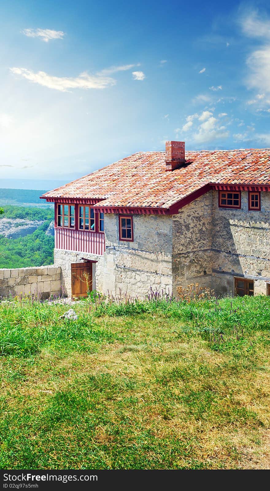 House in mountain. Nature composition.