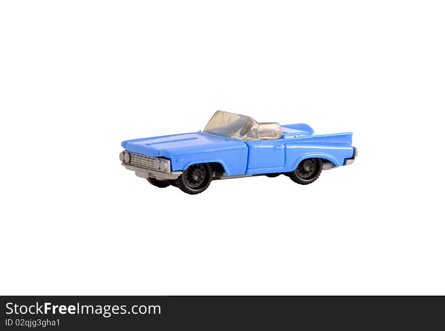 Funky old dirty plastic small toy blue cabriolet car on white.