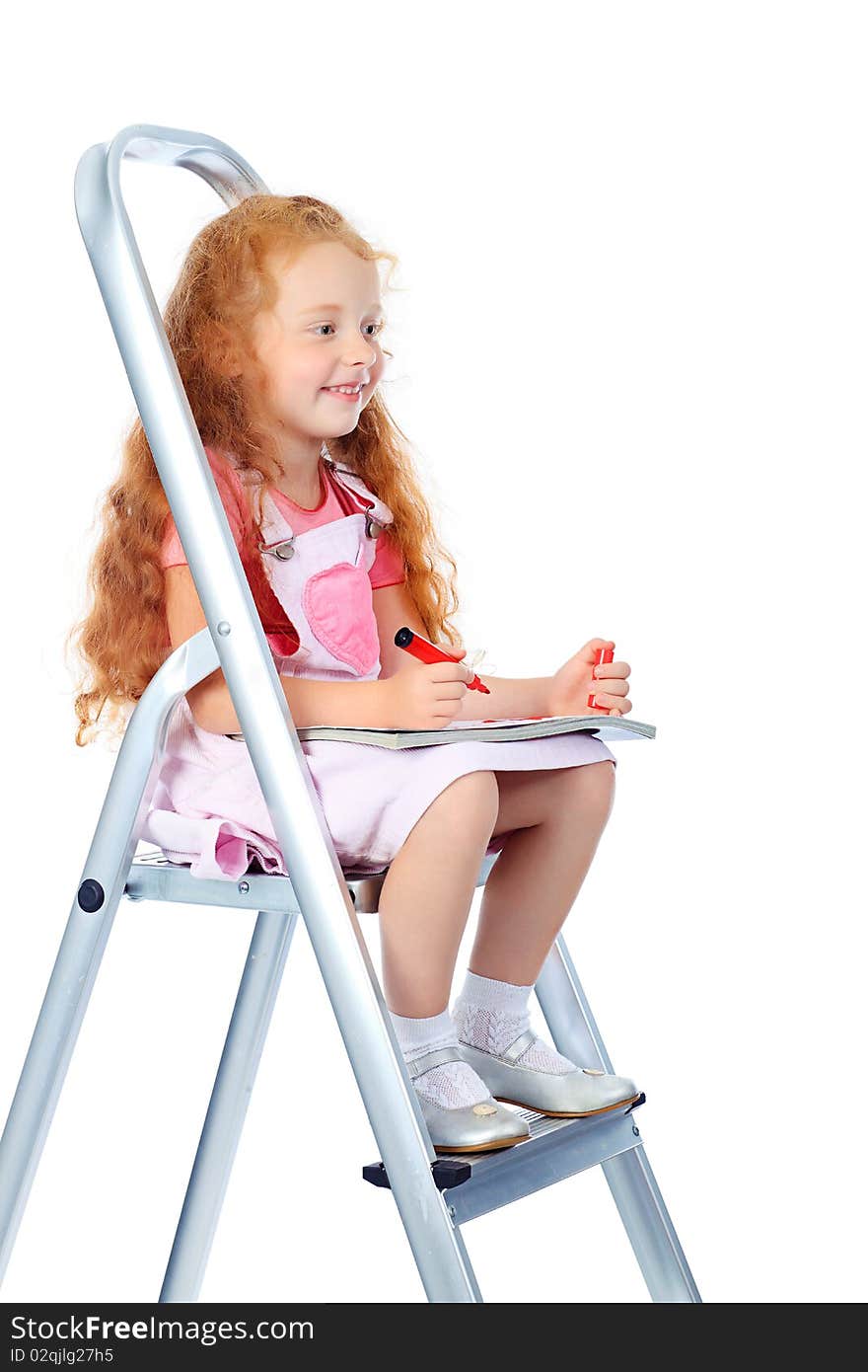 Portrait of a little girl sitting on steps and reading a book. Isolated over white background.