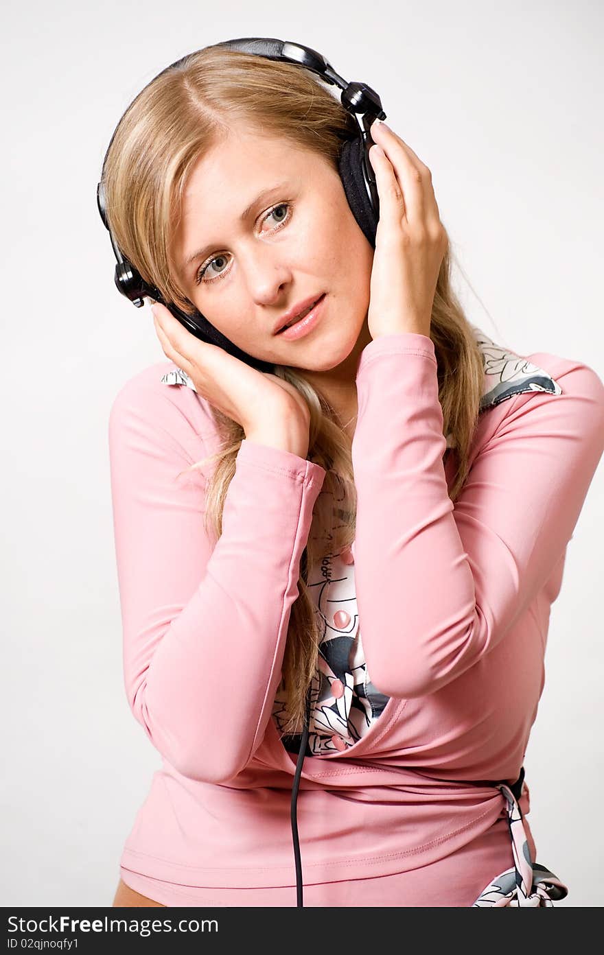 Women with headphones listening music