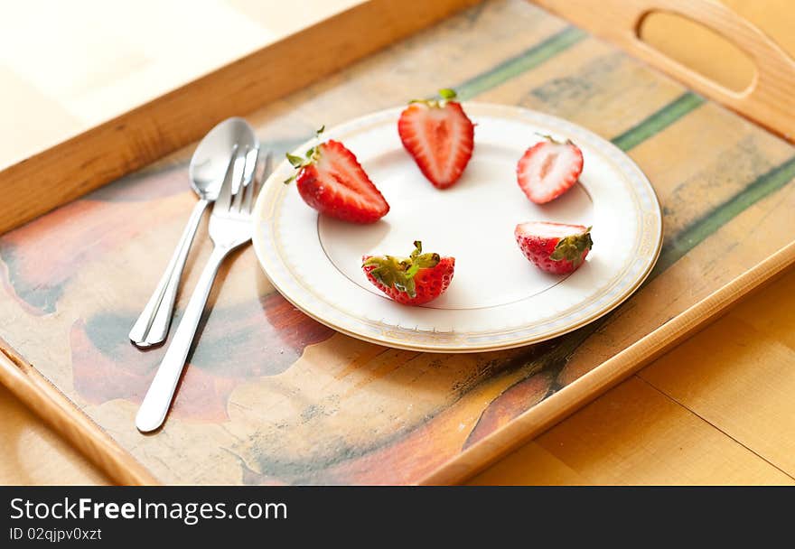 Small Plate With Sliced Strawberries. Small Plate With Sliced Strawberries