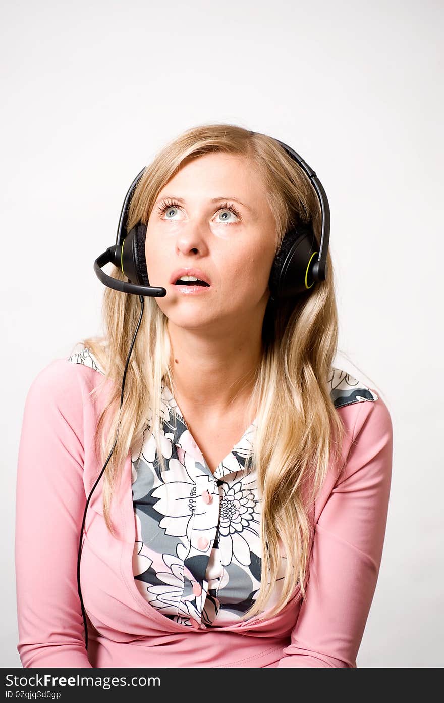 Women with headphones with shocked or surprised face