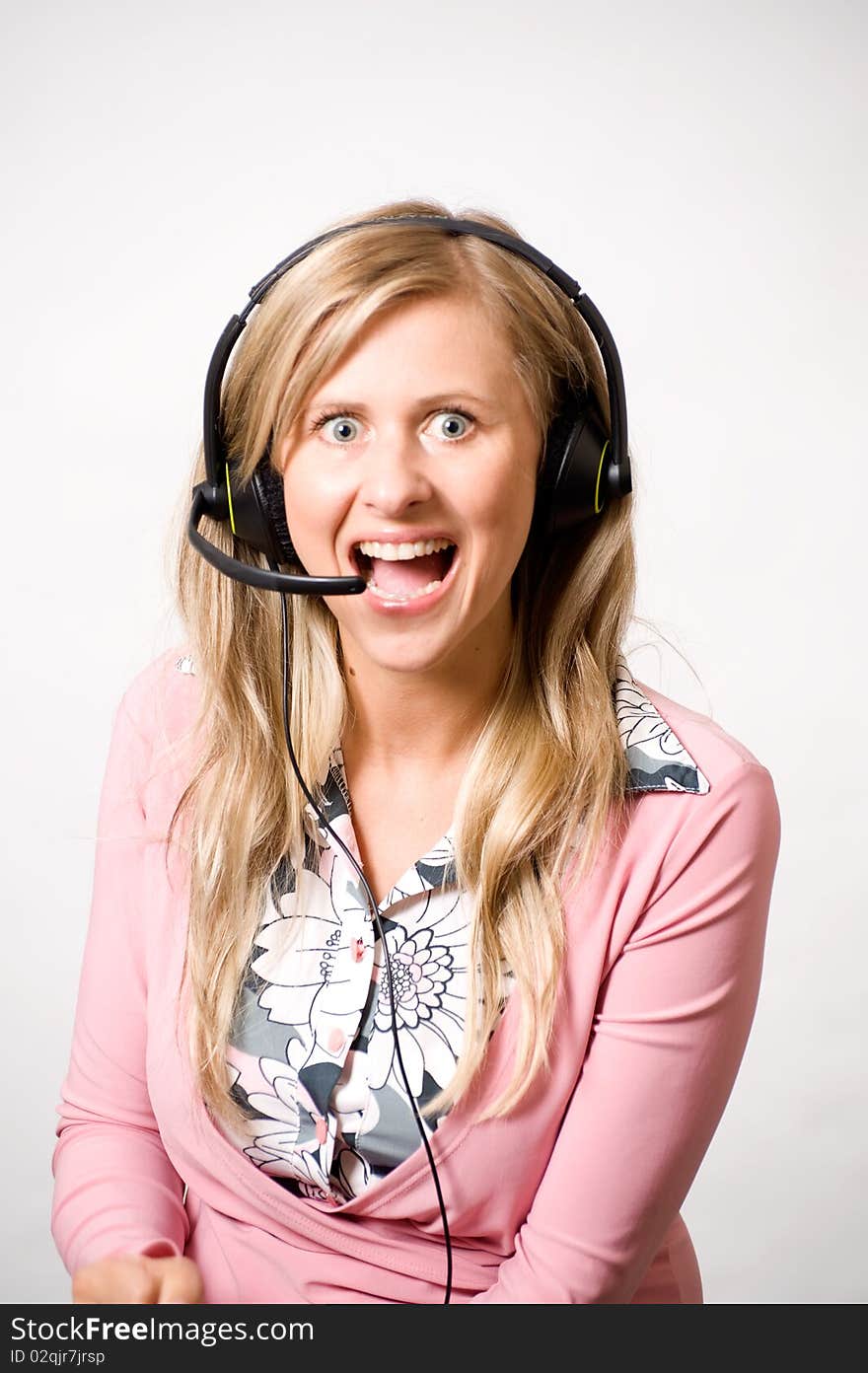 Women with headphones with mad face expresion