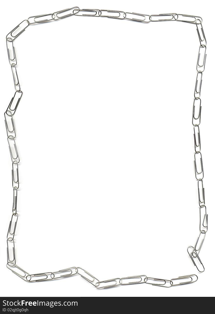 Isolated frame: a chain of stationery metal clips. Isolated frame: a chain of stationery metal clips