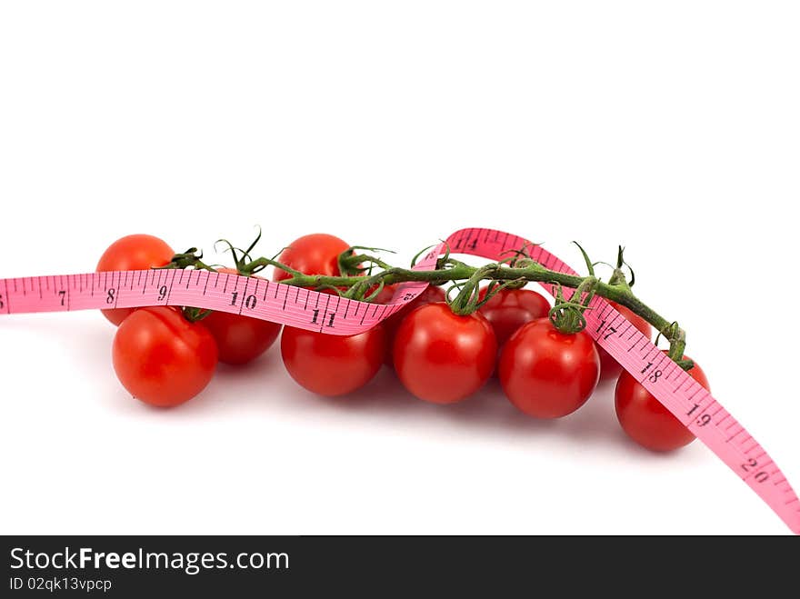 Fresh Tomato with measuring tape on white background. Fresh Tomato with measuring tape on white background