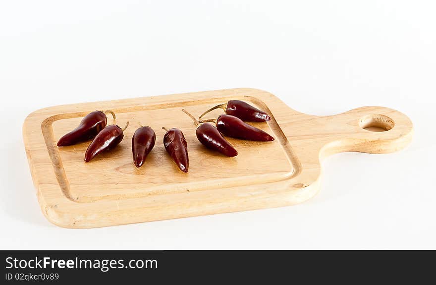 Hot red pepper on chopping board