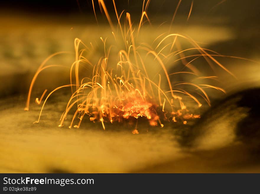 The sparks of an indoor firework. The sparks of an indoor firework.