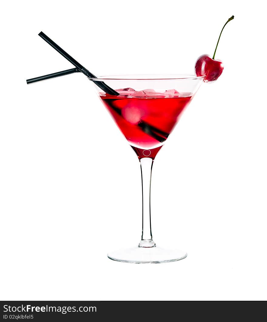 Red drink in martini glass, garnished with marachino cherry. Isolated on white background. Red drink in martini glass, garnished with marachino cherry. Isolated on white background.