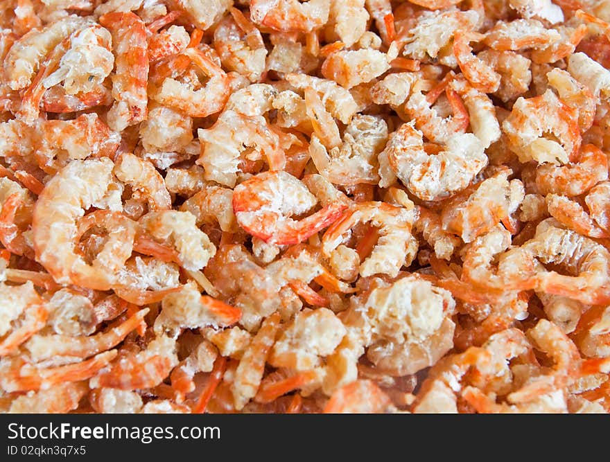 Orange background of dried shrimps