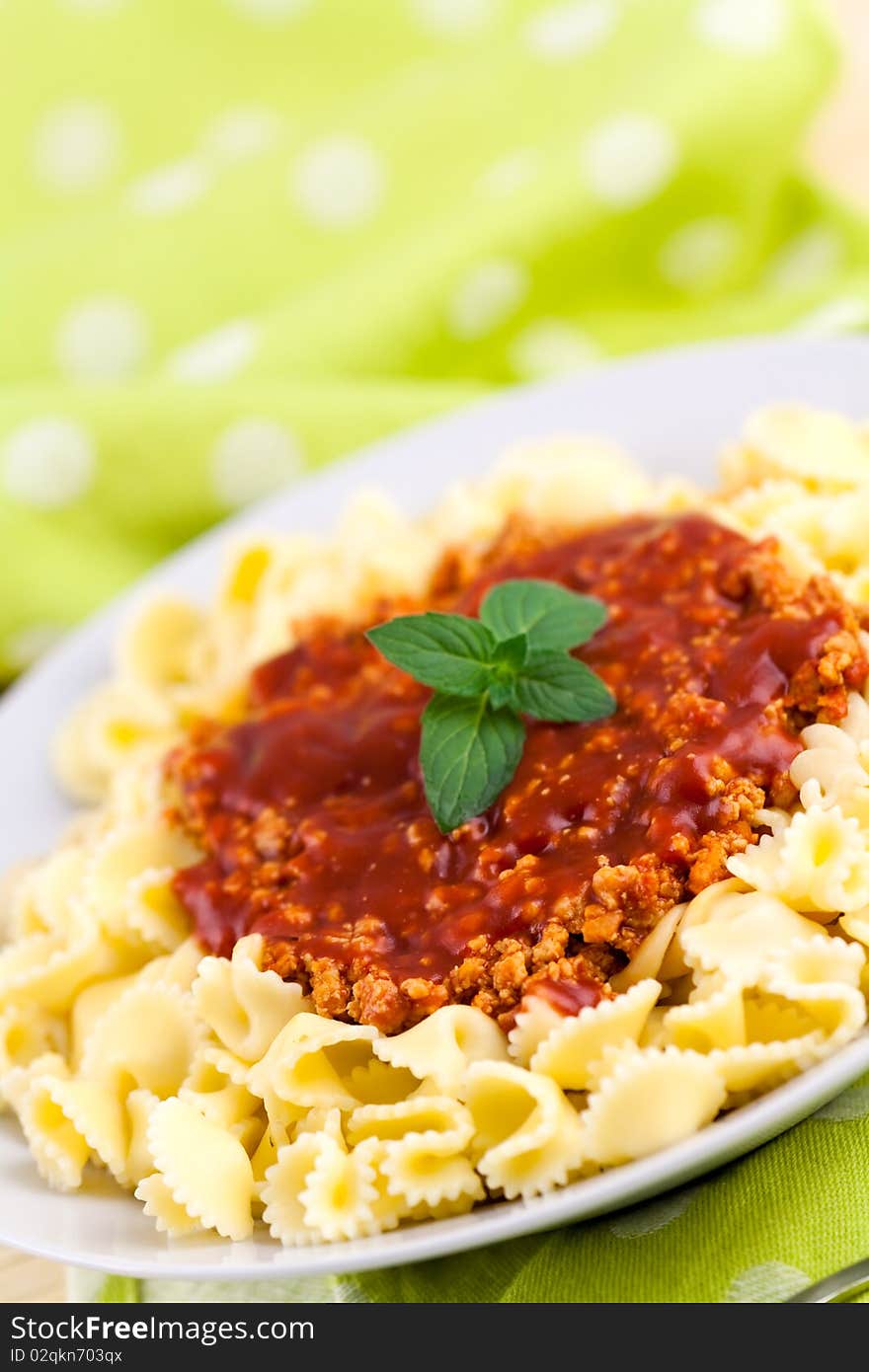 Spaghetti serve on plate with chopped meats