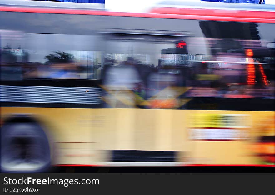 High speed and blurred bus trails on downtown road