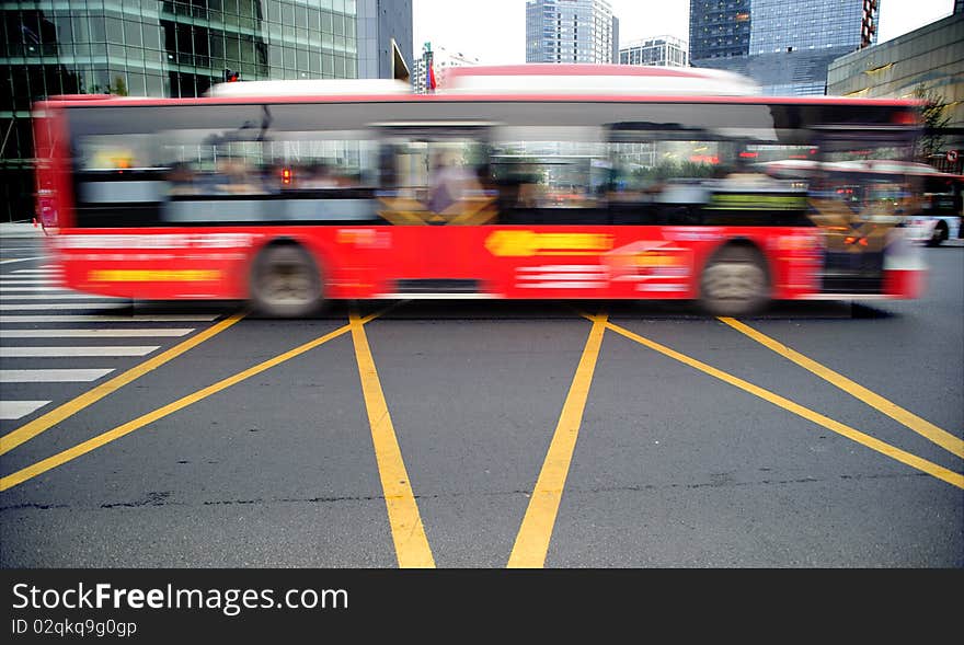 High speed and blurred bus trails on downtown road