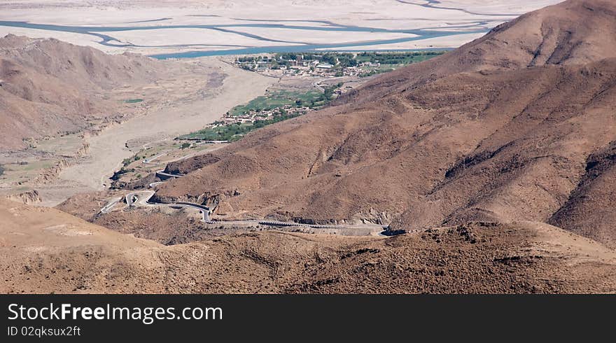 Yellowish mountain road view in tibet of China