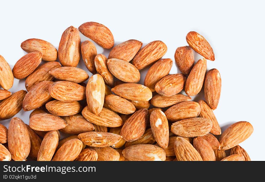 Salt almonds on white background