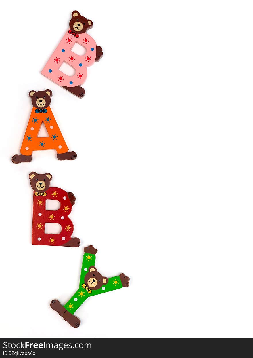 Wooden letters spelling baby isolated against a white background