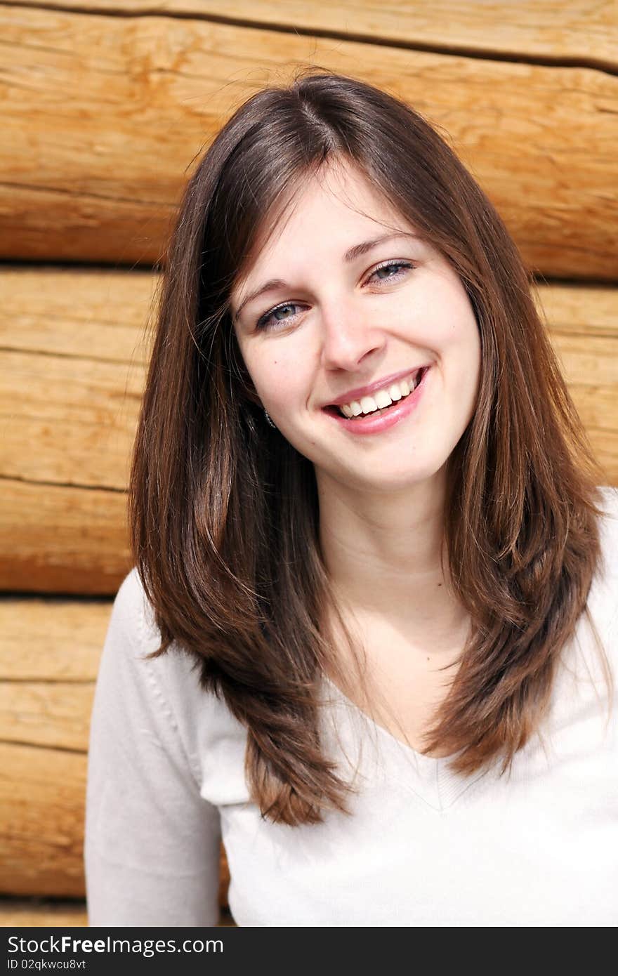 Beautiful young woman smiling. Outdoor portrait