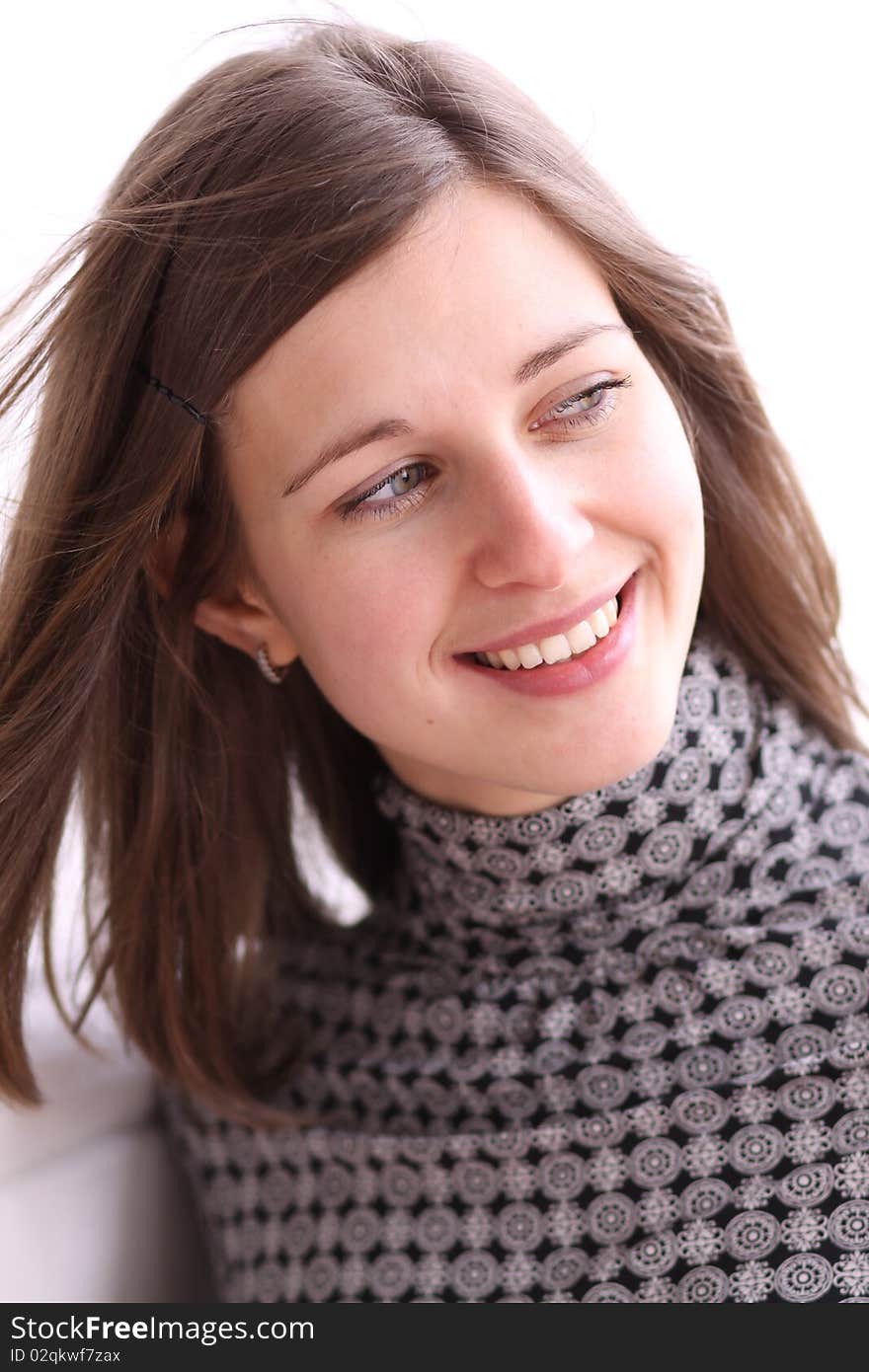 Beautiful young woman smiling. Outdoor portrait