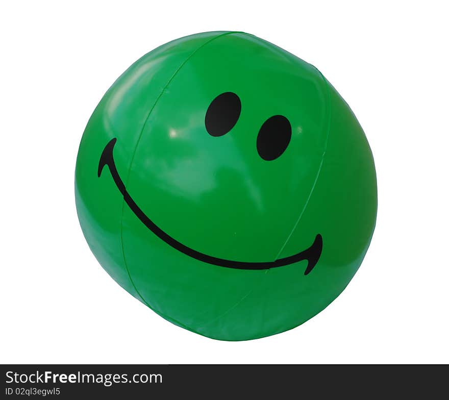 Green beach ball with a smiley face.