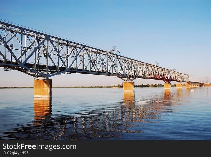 Railway bridge through the river