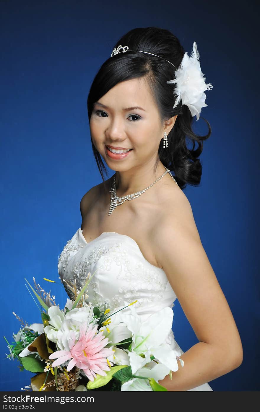 Asian woman in wedding dress