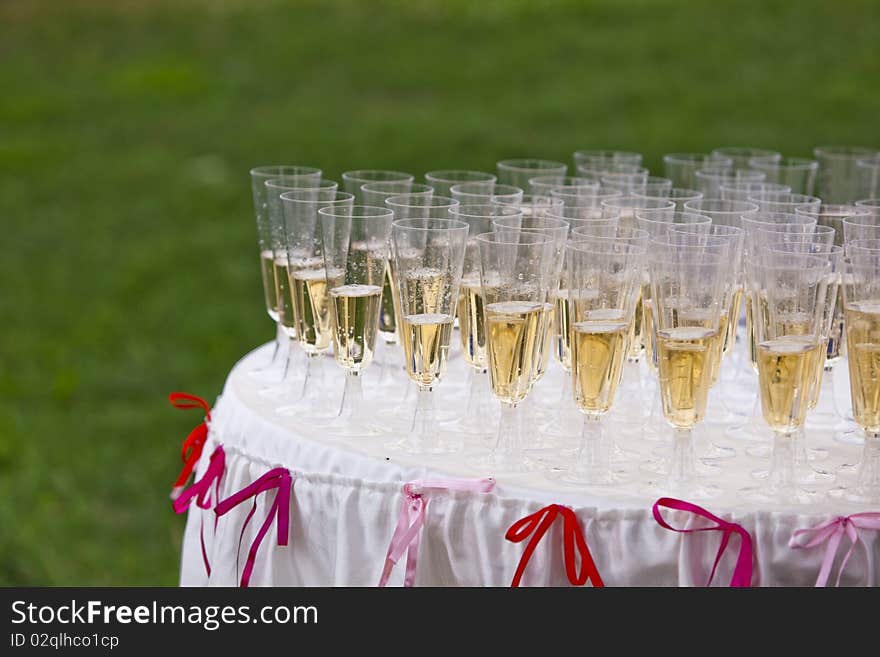 Image of glasses of champagne on the holiday table. Image of glasses of champagne on the holiday table.