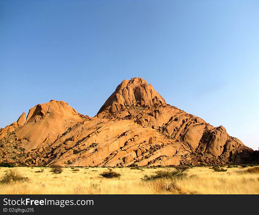 Lonely peak of Spitzkoppe mountain , Namibia