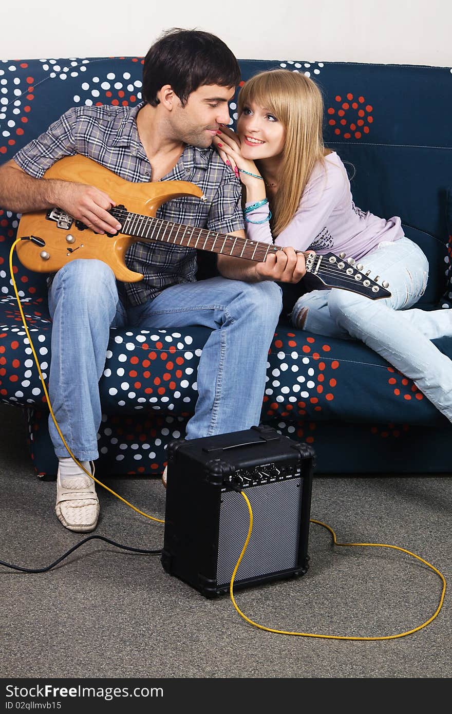 Romantic Couple With Electric Guitar